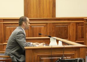 Jeremy Tripp, MCO director of government and political affairs, testifies before the legislature on a bill. 